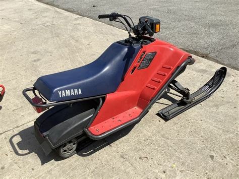 Has a new Chinook Fabrication 106" long track kit, new 106" long track, new extended tunnel cover, Chinook Fabrication hydraulic brake kit, new Heat Demon 2 stage heated grips, new air filter, new killswitch, new headlight bulb, new C&A Pro skis and carbides. . Yamaha snoscoot for sale